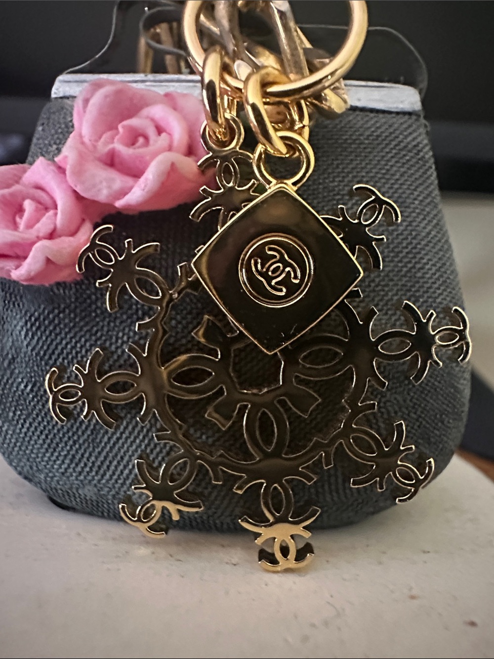 CHANEL Gold Snowflake Charm on Monet Stamped chain